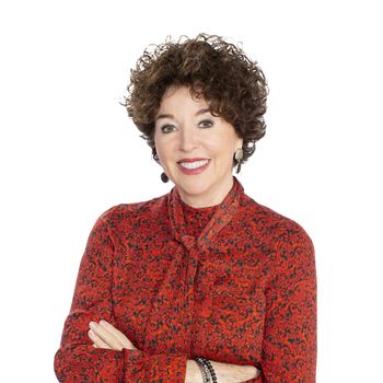 Portrait of Mitzi Gill, REALTOR®.